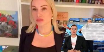 Сот тікелей эфирге плакат алып шыққан қызға айып салды